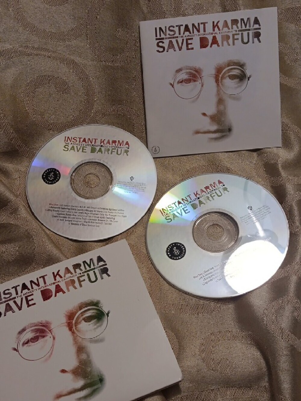 Instant Karma Save Darfur CD Set 2